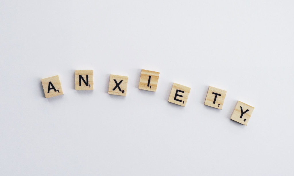 tiles spelling out ‘anxiety’