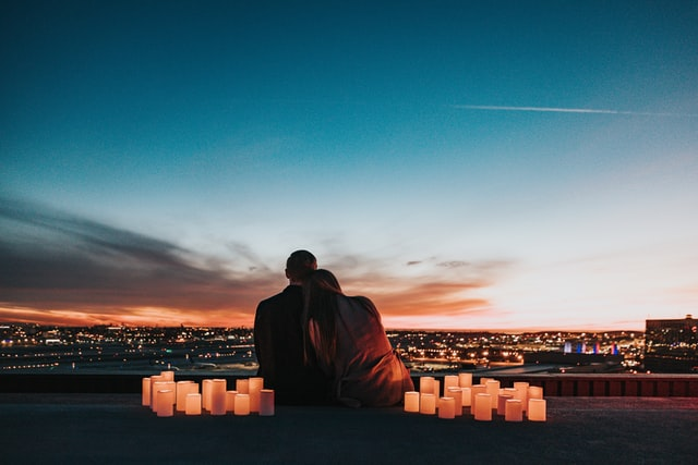 Two people sitting together