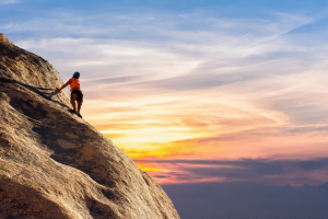 A person climbing a mountain