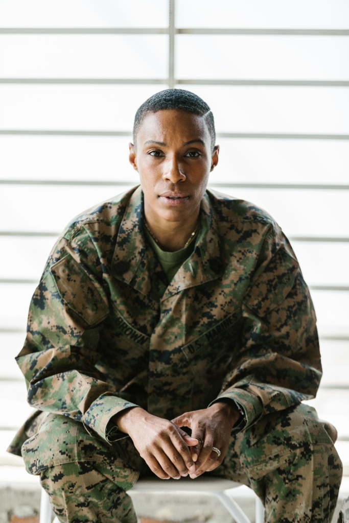 A female U.S. Army solider sitting down